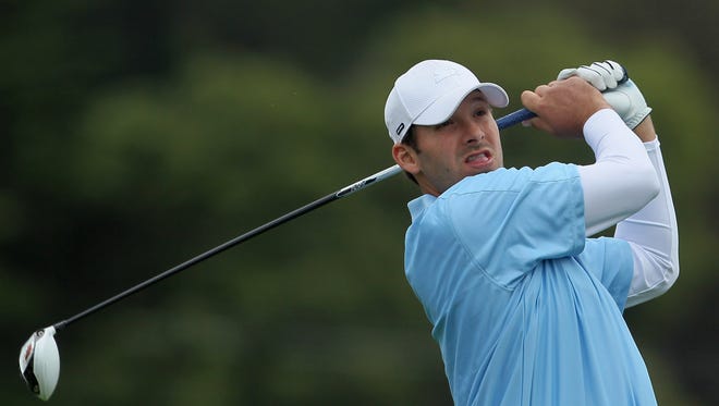 Tony Romo, NFL football quarterback for the Dallas Cowboys, hits his tee shot on the third hole during the final round of the AT&T Pebble Beach National Pro-Am at Pebble Beach Golf Links on February 12, 2012 in Pebble Beach, California.