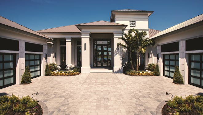 The Hemingway at Miromar Lakes Beach & Golf Club features five bedrooms, five full baths and two half-baths, with 6,136 square feet under air and 9,416 total square feet.
