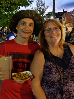 Hungry festival-goers enjoy ribs and more at the Best in the West Nugget Rib Cook-off in Sparks over Labor Day weekend.