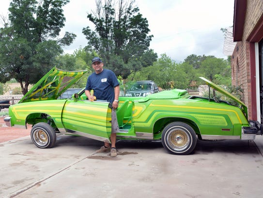 Jesse Paredes, a member of Good Times Car Club, and his 1979 Oldsmobile Cutlass Supreme, which he fondly named "Ambitions." The car will be on display at the Dale Gas! car show on Friday,  June 22.