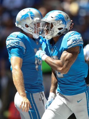 Lions quarterback Jake Rudock congratulates wide receiver Kenny Golladay after his touchdown during the first quarter of the Lions' 24-10 exhibition win over the Colts on Sunday, Aug. 13, 2017, in Indianapolis.