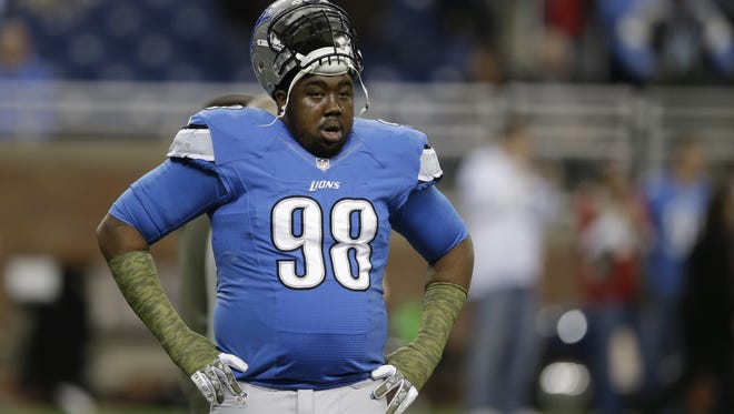 Detroit Lions defensive tackle Nick Fairley (98) is seen during pre-game drills of an NFL football game against the Tampa Bay Buccaneers at Ford Field in Detroit, Sunday, Nov. 24, 2013.