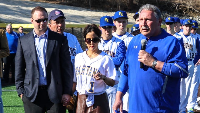 Maine-Endwell coach Gary Crooks speaks Wednesday during inaugural ceremonies for the new baseball field that bears his name. On hand were film producer Thomas Tull, left.