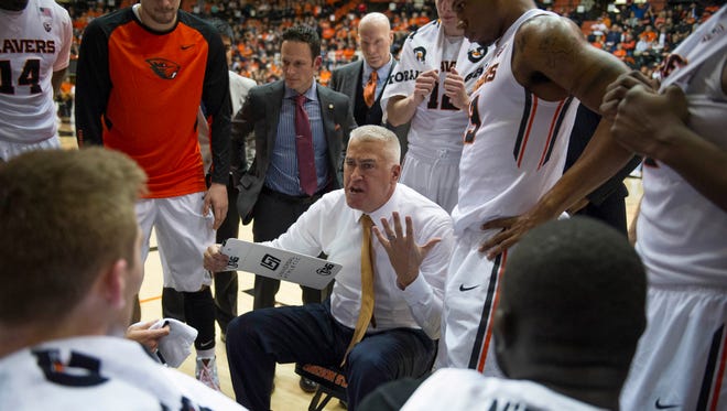 Jan 6, 2016; Corvallis, OR, USA; Oregon State Beavers head coach Wayne Tinkle talks to his players during a time out in the second half against the Stanford Cardinal at Gill Coliseum. Mandatory Credit: Cole Elsasser-USA TODAY Sports