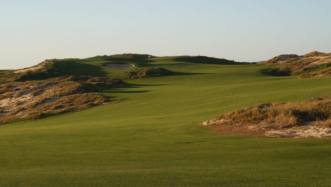 The 8th hole at Quivira Golf Club climbs the sandy dunes away from the Pacific Ocean.