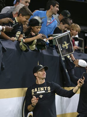 New Orleans Saints quarterback Drew Brees takes a selfie