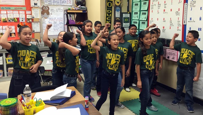 Johanna O'Donnell Intermediate School fourth-graders perform the cheer they made up to go with their assigned college, the University of Oregon.