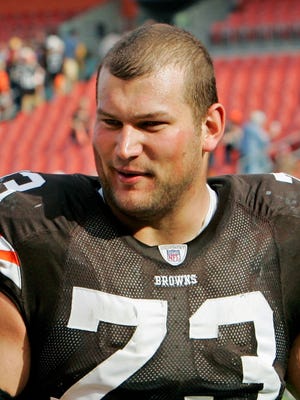 Cleveland Browns offensive lineman Joe Thomas walks off the field after an NFL football game against the Baltimore Ravens, in this Sept. 30, 2007 file photo, in Cleveland.