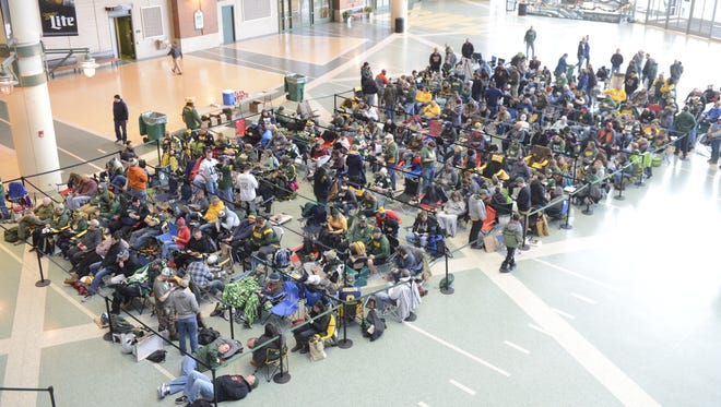 Green Bay Packers fans line up early to get Aaron Rodgers autographs on Dec. 18, 2017, in the Lambeau Field Atrium. Rodgers signed 200 autographs to raise money for Salvation Army. The queue was full by early morning.