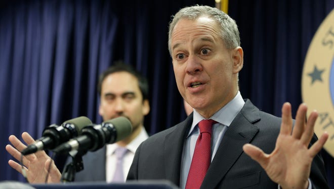 FILE - In this March 21, 2016, file photo, New York Attorney General Eric Schneiderman speaks during a news conference in New York.