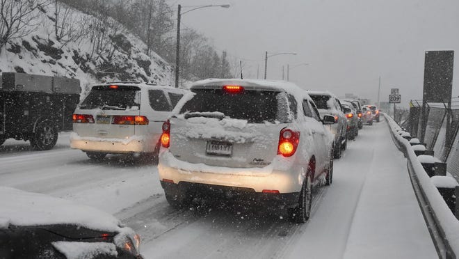 Traffic was backed up due to the snow on Rt. 61 in Pottsville, Pa., on Thursday afternoon, Nov. 15, 2018. The wintry weather was barreling eastward Thursday, with snow and ice expected from Ohio and the Appalachian Mountains through Washington, D.C., New York and New England. (Jacqueline Dormer/Republican-Herald via AP)