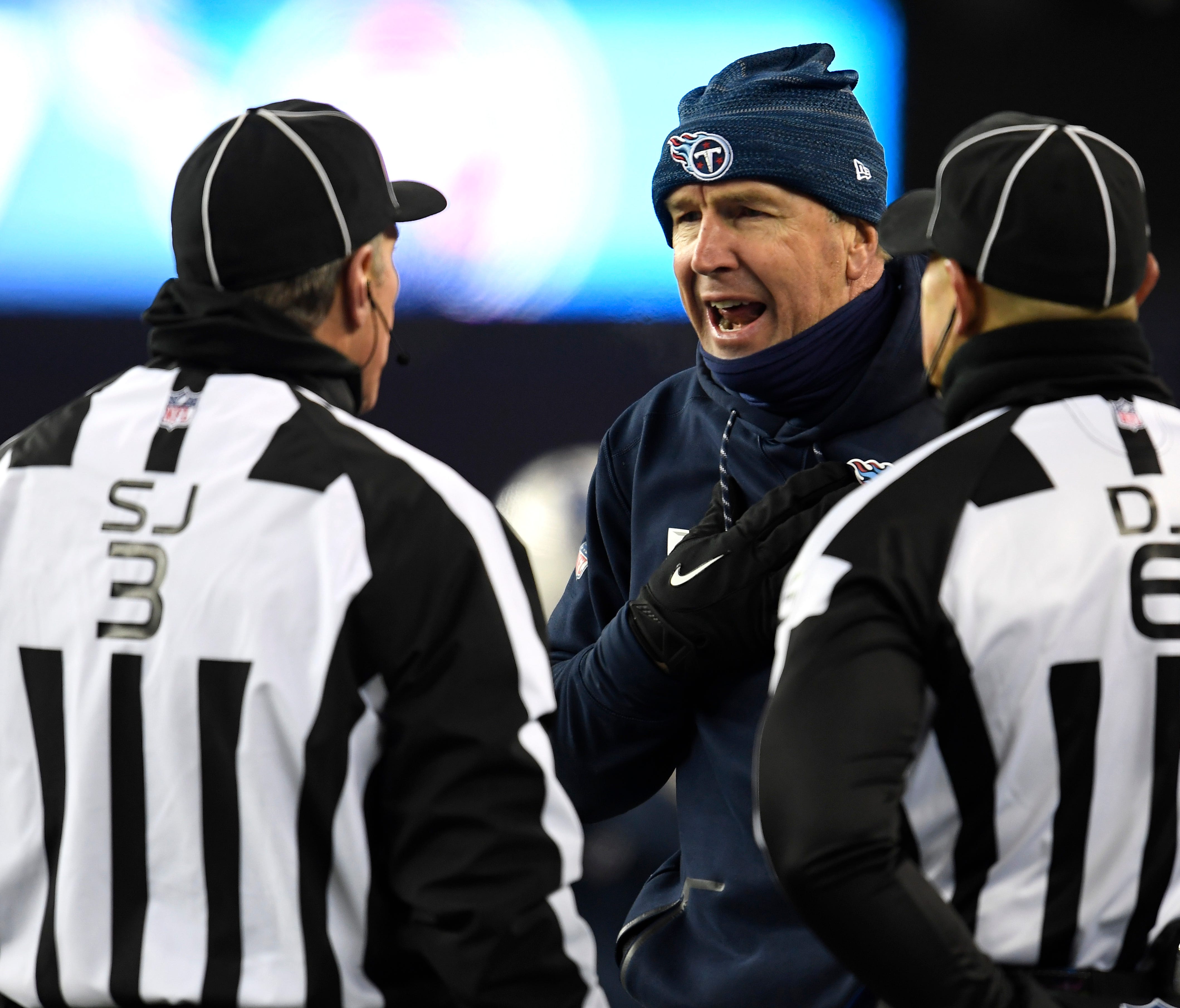 Titans head coach Mike Mularkey argues with referees during the first half of the AFC Divisional Playoff game at Gillette Stadium Saturday, Jan. 13, 2018, in Foxborough, Mass.