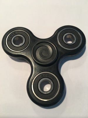 Fidget spinners are really popular right now.