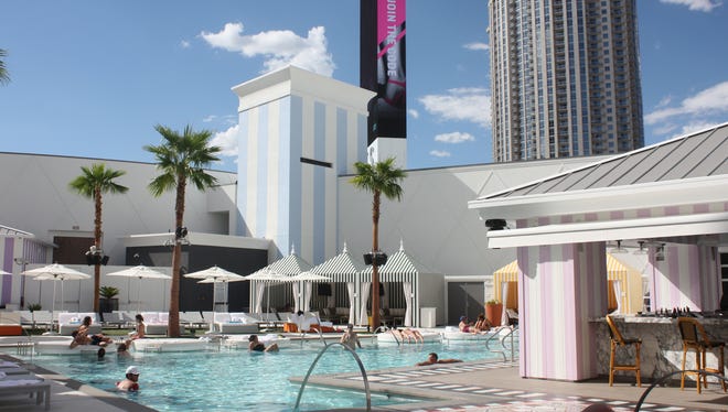 White decor with black and pale-pink accents carries over to the Foxtail pool area at the SLS Las Vegas Hotel & Casino.