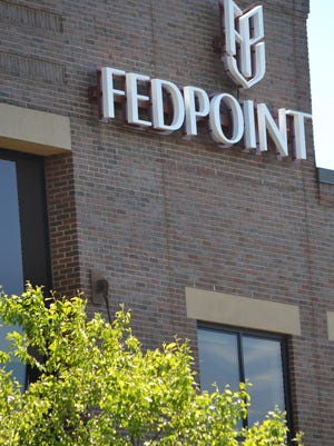 The new FedPoint logo has been placed at the company's headquarters at 100 Arboretum Drive on the Newington side of the Pease International Tradeport.