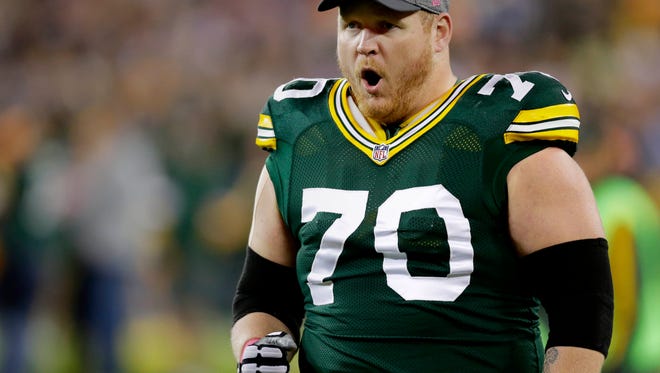 Green Bay Packers guard T.J. Lang (70) gets pumped up on the sidelines before  the  23-16 win over the  New York Giants at Lambeau Field on Oct. 9, 2016.