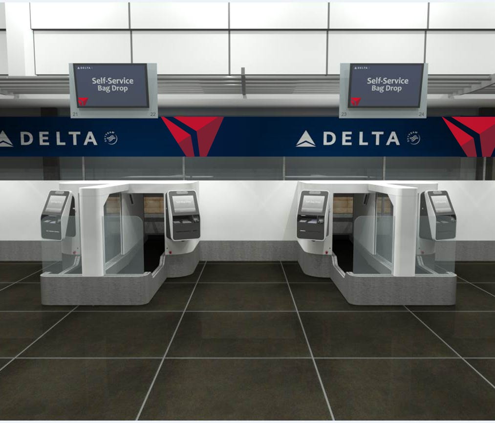 This image provided by Delta shows the new bag-drops that will be added this summer at the carrier's hub at the Minneapolis/St. Paul airport.