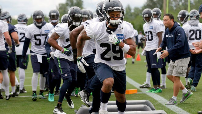 Seattle Seahawks safety Earl Thomas (29) participates during NFL football practice,  Tuesday, June 14, 2016, at the Virginia Mason Athletic Center in Renton, Wash. (Johnny Andrews/The Seattle Times via AP) SEATTLE OUT; USA TODAY OUT; MAGS OUT; TELEVISION OUT; NO SALES; MANDATORY CREDIT TO BOTH THE SEATTLE TIMES AND THE PHOTOGRAPHER