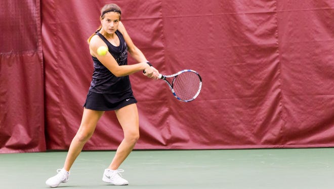 Andrea Garcia with eyes on the ball as FSU Women's tennis team defeats Airforce on Sat., Feb.18 at the FSU Indoor Tennis Facility in Tallahassee, FL by a score of 5-2