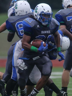 St. Georges running back Gary Brightwell breaks free for a 79-yard touchdown run in the first quarter Saturday.