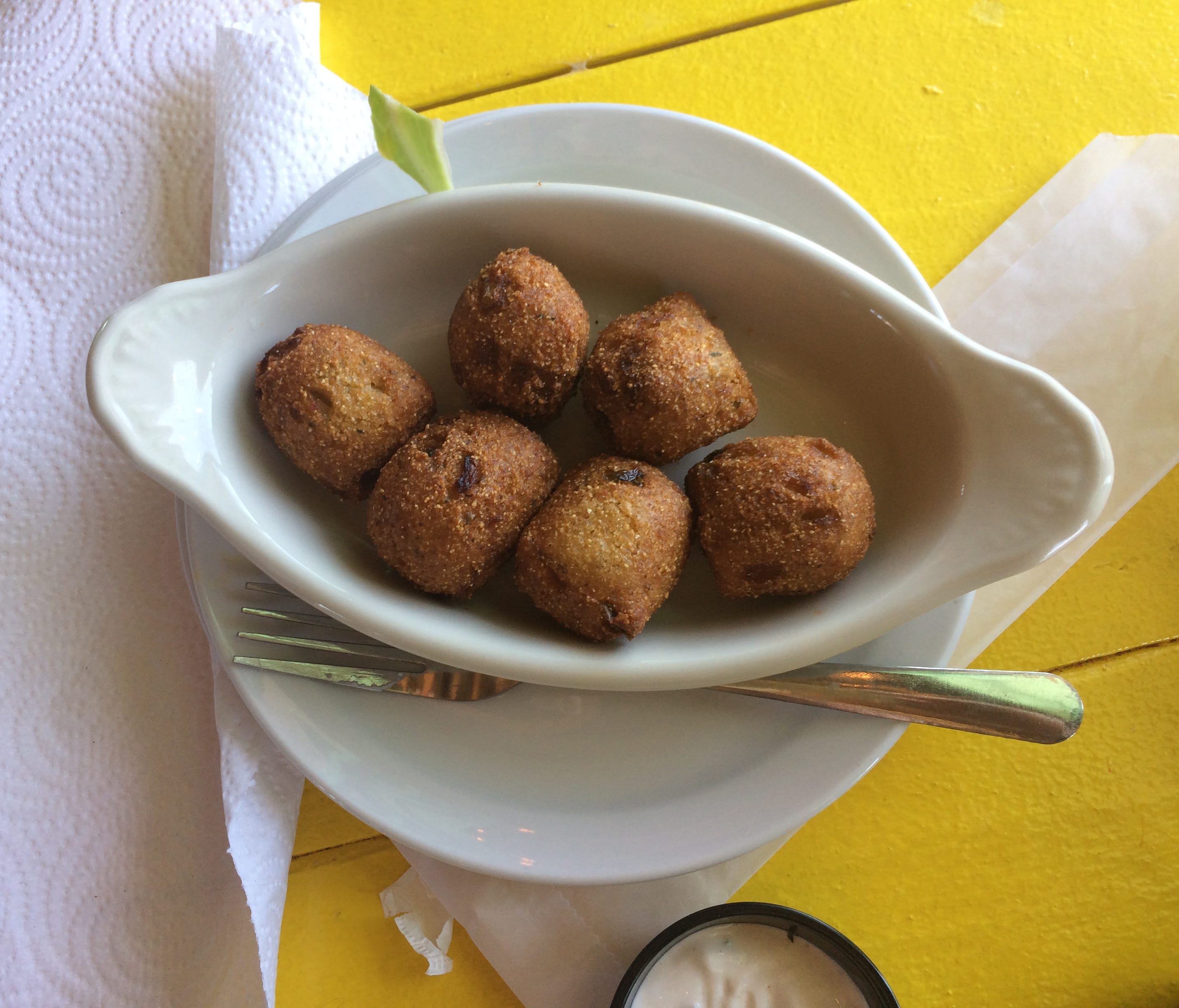In addition to the house-smoked Wahoo dip, the jalapeño hushpuppies are a local favorite.