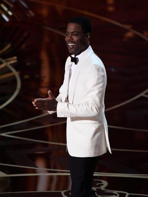 Chris Rock delivers the opening monologue at "The 88th annual Academy Awards" at the Dolby Theater.