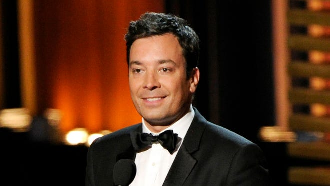In this Aug. 25, 2014, photo, Jimmy Fallon presents an award at the 66th Annual Primetime Emmy Awards in Los Angeles. Fallon got the royal treatment at Harvard. "The Tonight Show" host and "Saturday Night Live" alum was honored Saturday, Oct. 24, 2015, by the Harvard Lampoon, the country's oldest continuously published humor magazine.