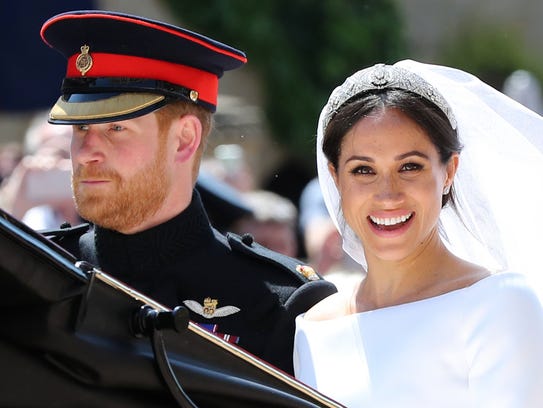Britain's Prince Harry, Duke of Sussex and his wife