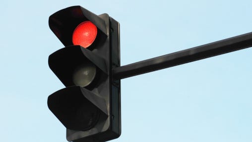 Motorists in Charlotte this morning should treat all traffic lights as four-way stops as a power outage continues in that community, officials said.