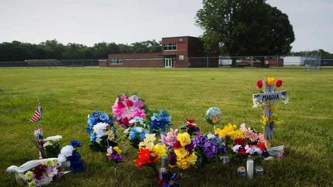 Flowers and memorials have been placed on the grounds at Bunn-O-Matic's Stevenson Drive facility in Springfield where three people were fatally shot Friday, June 26, 2020.