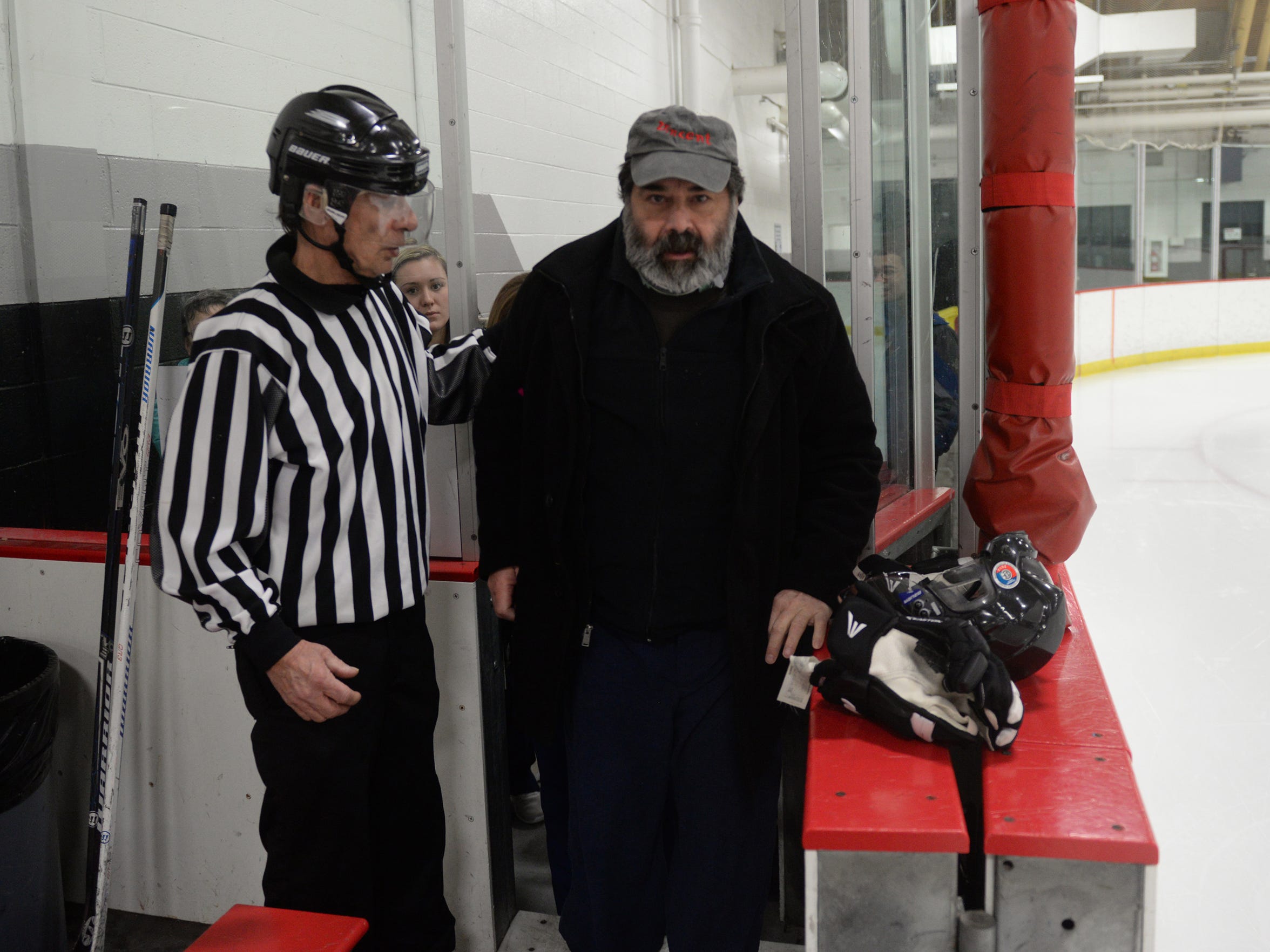 "Father D" returns to ice rink after serious spinal cord ...