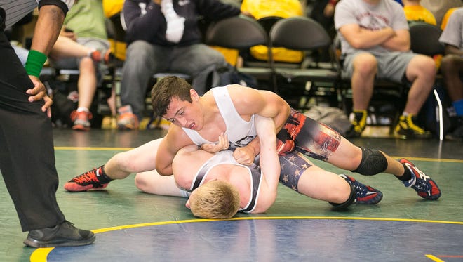Three-time Pennsylvania state finalist Michael Kemerer (top) committed Wednesday to Iowa.