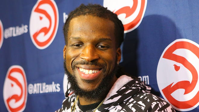 DeMarre Carroll, who will be a free agent July 1, can’t help but smile when asked about the payday he will likely have coming while taking questions from the reporters during NBA basketball media availability on May 28, 2015, in Atlanta.