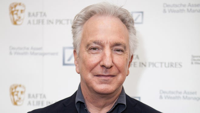 FILE - In this Wednesday, April 15, 2015 file photo, actor Alan Rickman poses for photographers on arrival at 'BAFTA A Life In Pictures, with Alan Rickman'  in central London.  British actor Alan Rickman, whose career ranged from Britains Royal Shakespeare Company to the Harry Potter films, has died. He was 69.  Rickmans family said Thursday, Jan. 14, 2016 that the actor had died after a battle with cancer. (Photo by Grant Pollard/Invision/AP, File)