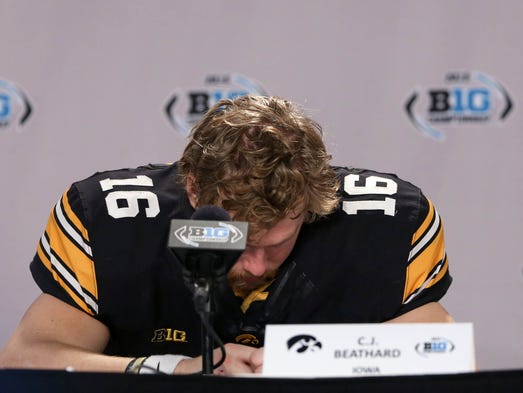 Iowa Hawkeyes quarterback C.J. Beathard (16) reacts