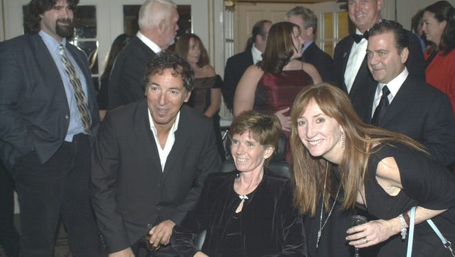 Bruce Springsteen, honoree Joan Dancy of Middletown and Patti Scialfa at the Field of Hope Gala in 2003.