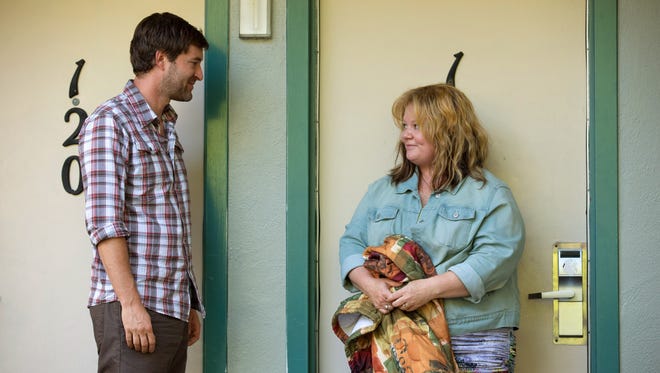 Mark Duplass, left, and Melissa McCarthy in a scene from “Tammy.”