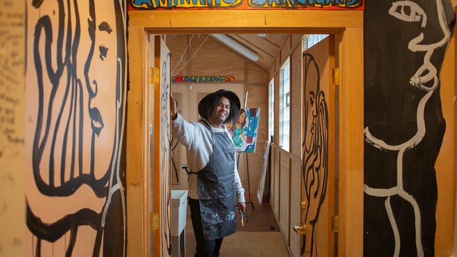 Bryan Christopher Moss photographed in the home of late artist Aminah Robinson