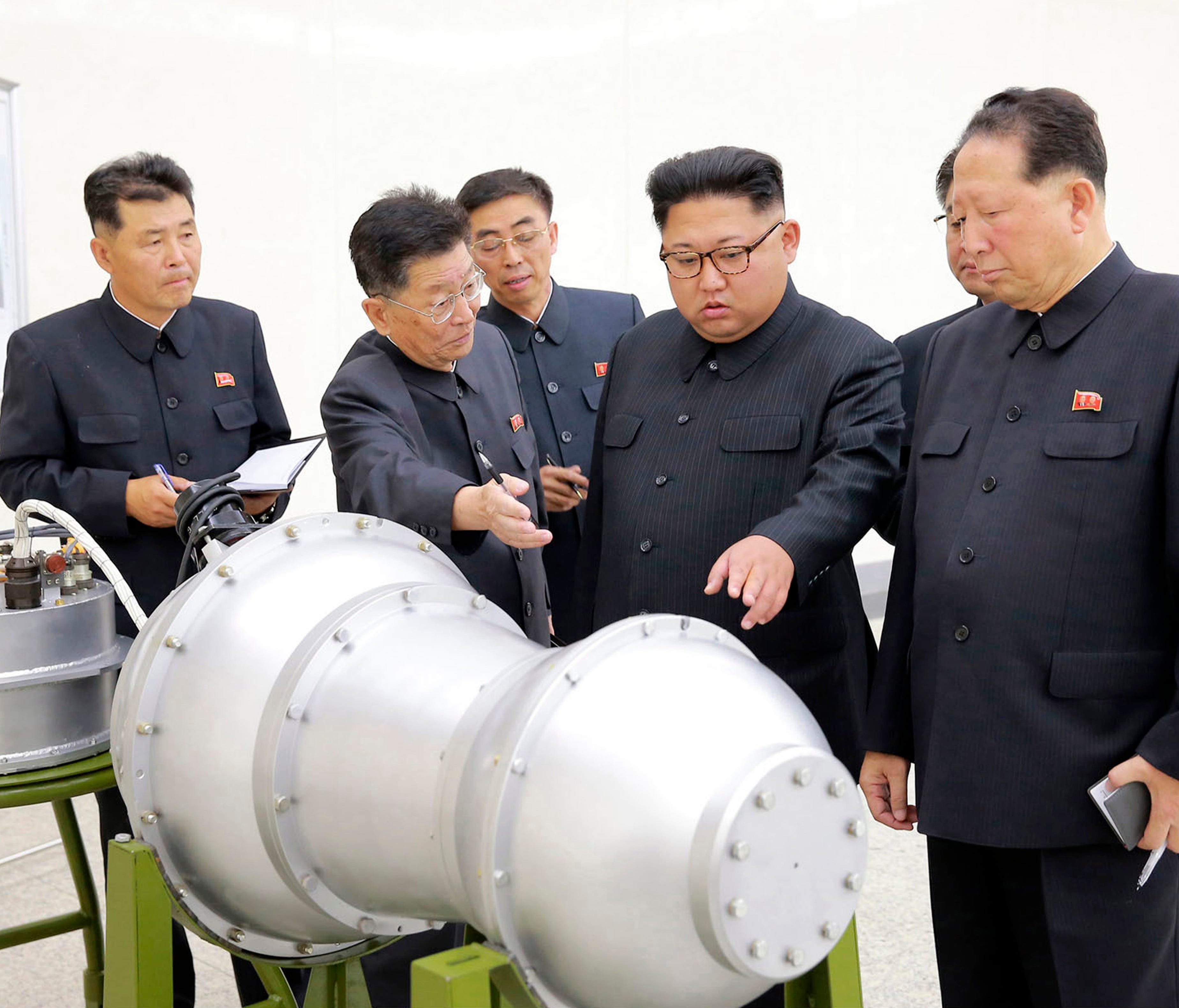 This undated file photo distributed on Sept. 3, 2017, by the North Korean government, shows North Korean leader Kim Jong Un, second from right, at an undisclosed location in North Korea.