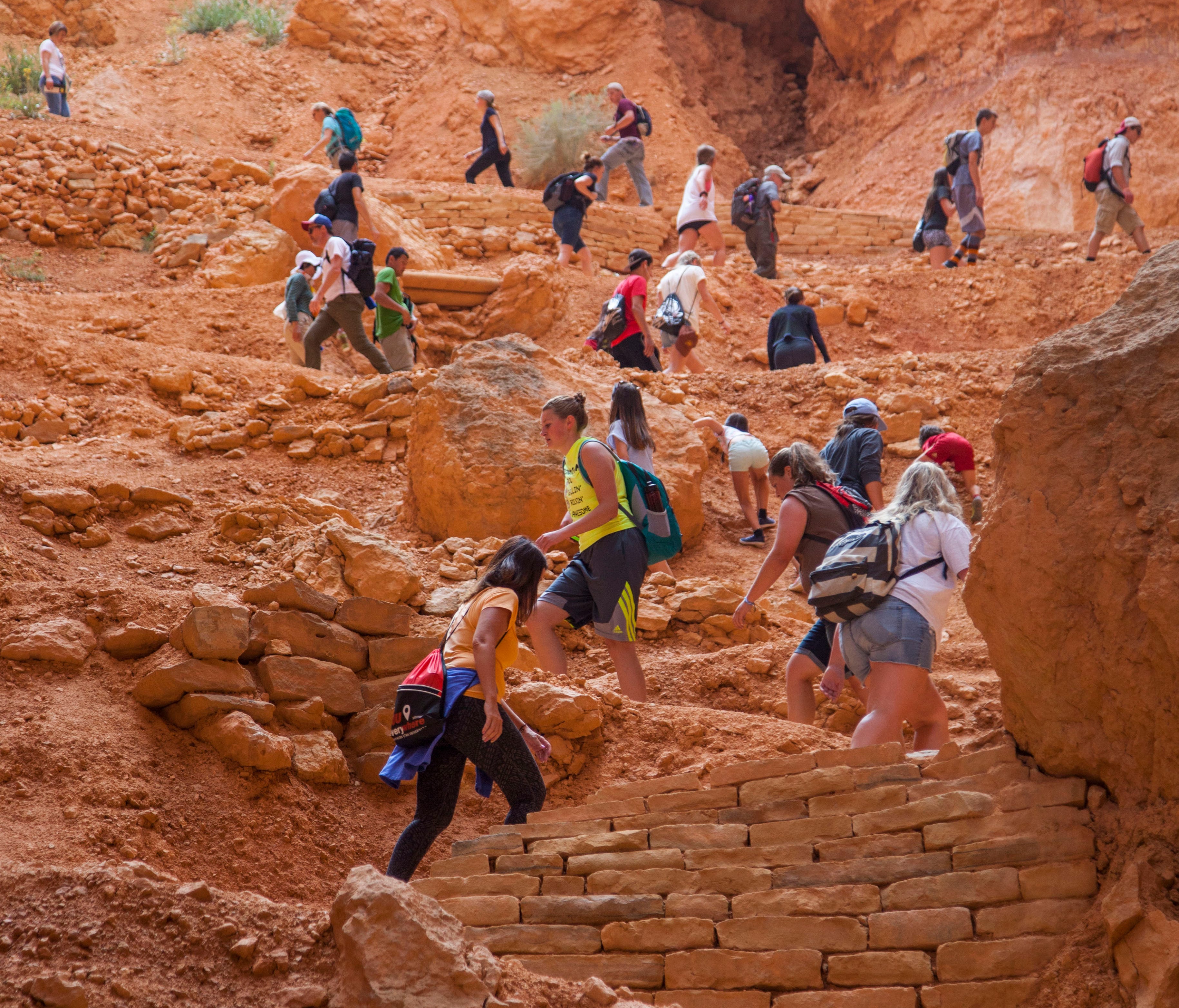 Southern Utah University students and tourists hike through Bryce Canyon National Park during the National Park Service centennial, Thursday, Aug. 25, 2016.