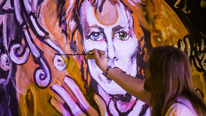 Wilmington artist and musician Sean Flynn painted a mural of David Bowie at Wilmington bar  1984 to pay tribute to the late rocker.