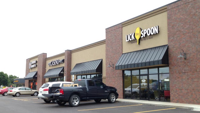 Lick the Spoon opened this morning in a new retail center at 10th Street and Bahnson Avenue.