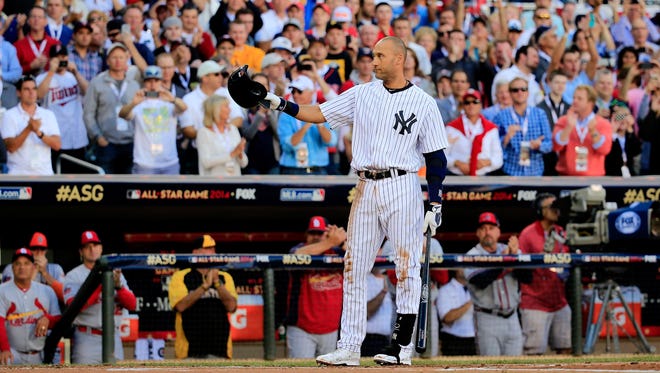 The Yankees' Derek Jeter acknowledges the crowd before his first at bat during the 85th MLB All-Star Game at Target Field on Tuesday, in Minneapolis.