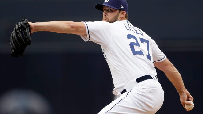 San Diego Padres relief pitcher Jordan Lyles works against a Miami Marlins batter during the first inning of a baseball game Thursday, May 31, 2018, in San Diego. (AP Photo/Gregory Bull)