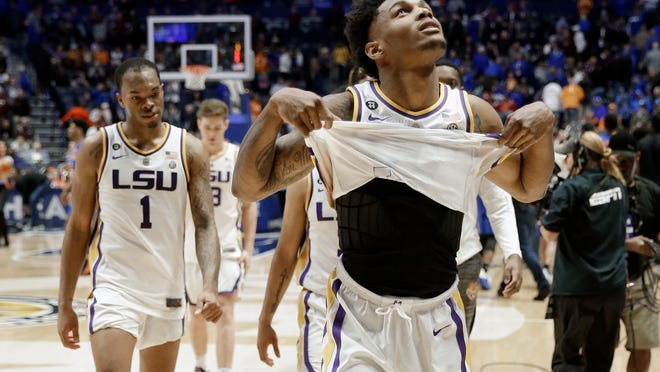 LSU guard Marlon Taylor, right, and guard Javonte Smart (1) walk off the court after losing to Florida in an NCAA college basketball game at the Southeastern Conference tournament Friday, March 15, 2019, in Nashville, Tenn. Florida won 76-73. (AP Photo/Mark Humphrey)