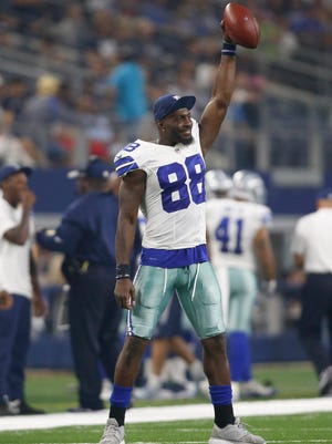 Dallas Cowboys wide receiver Dez Bryant (88) celebrates a touchdown in the third quarter against the Miami Dolphins at AT&T Stadium. Dallas won 41-14.
