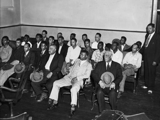 Twenty-five black men sit in Maury Circuit Court on