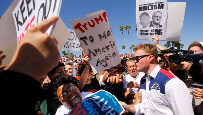 Trump supporters and protesters chat pleasantly in Arizona
