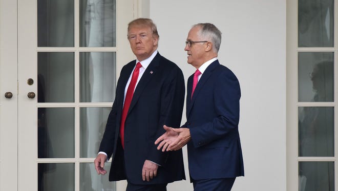 President Trump walks toward the Oval Office with Australian Prime Minister Malcolm Turnbull Friday.