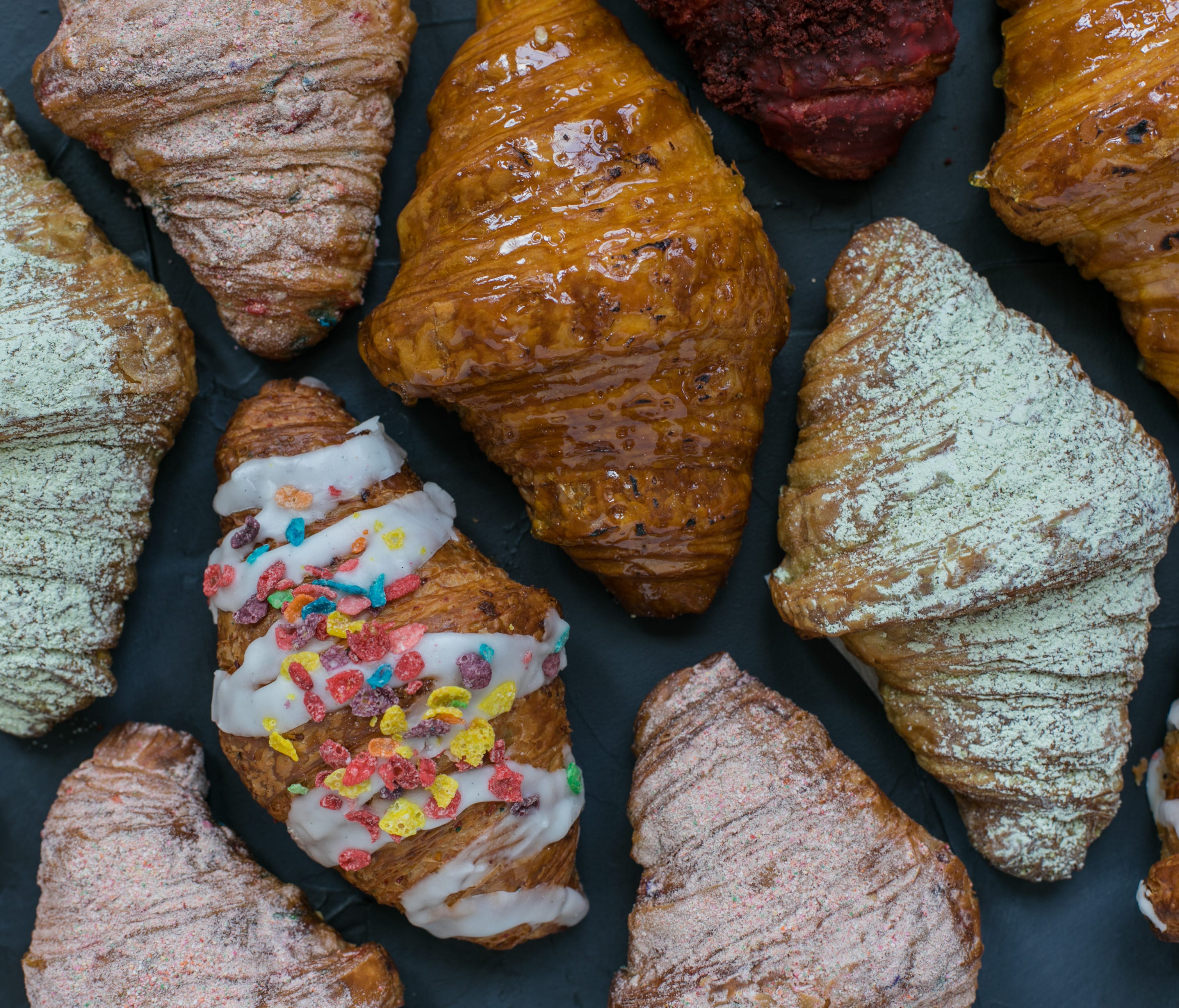 The multi-concept restaurant and food hall's bakery serves birthday cake, matcha, fruitty pebbles and more flavors on and inside croissants.